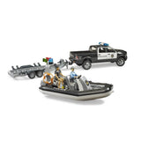 Bruder 02507 - RAM 2500 Polizei Pickup mit L + S Modul, Anhänger, Boot und 2 Figuren